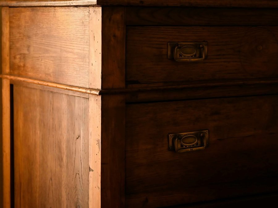Antique solid wood dresser corner with brass drawer hardware